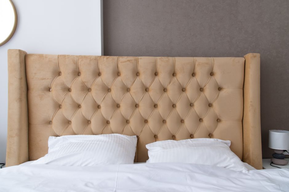 How to Pick a Headboard That Anchors the Room